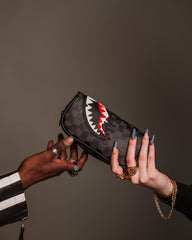 SHARKS IN PARIS THUNDERDRIP POUCH | Sprayground Bargain