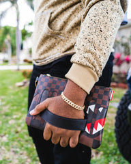 XTC SHARKS IN PARIS CROSSOVER CLUTCH | Sprayground Limited Offer