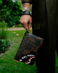 XTC SHARKS IN PARIS CROSSOVER CLUTCH | Sprayground Limited Offer