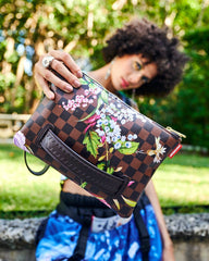 GARDEN OF SHARKS CROSSOVER CLUTCH | Sprayground Savings