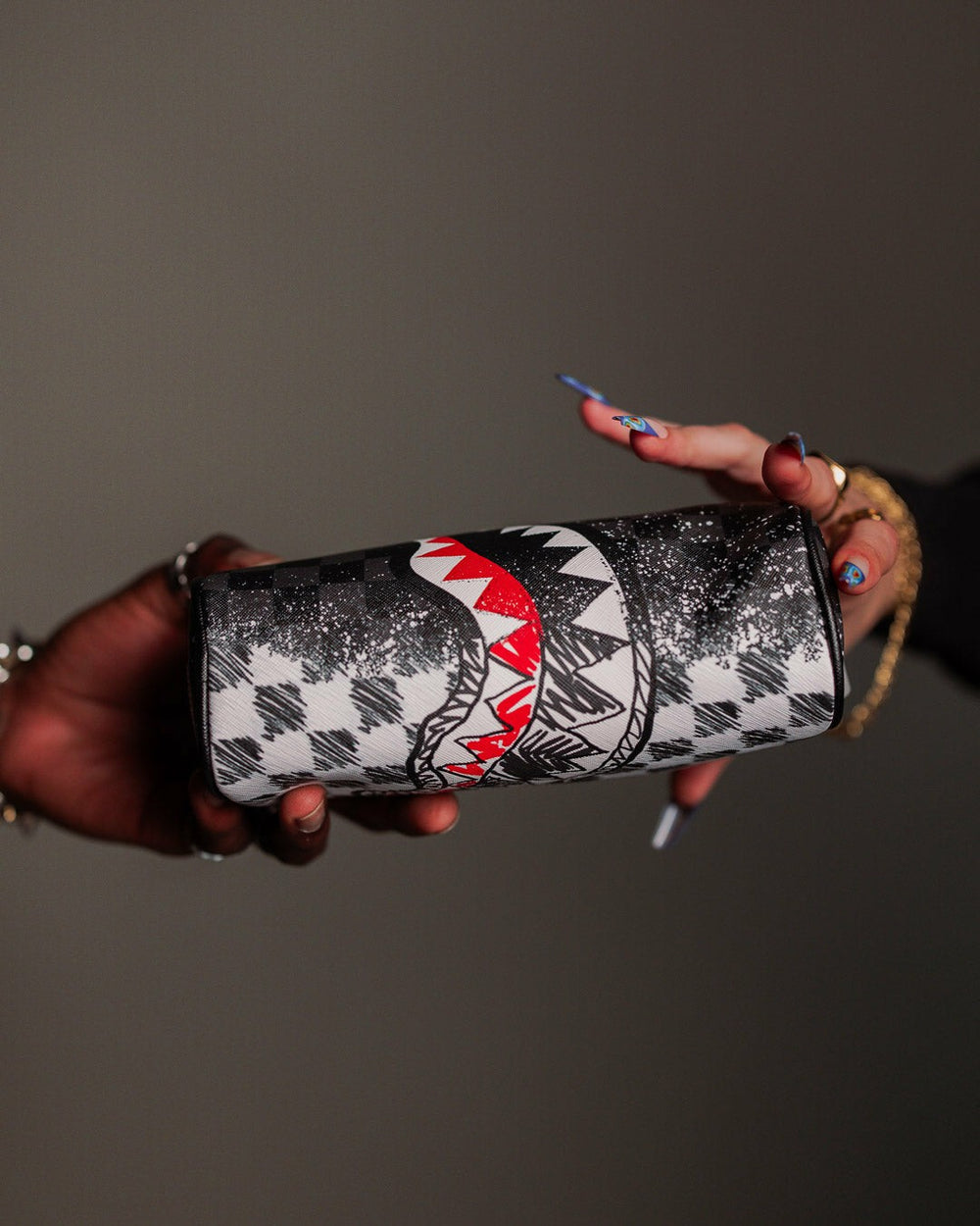 SCRIBBLE DRIBBLE CHECK POUCH | Sprayground Value Deal