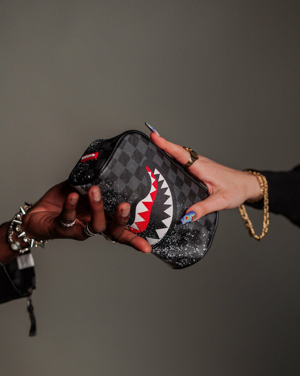 SCRIBBLE DRIBBLE CHECK POUCH | Sprayground Value Deal