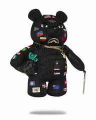 JAMES FIRST CLASS GLOBAL FLAGS MONEYBEAR BACKPACK | Sprayground Outlets