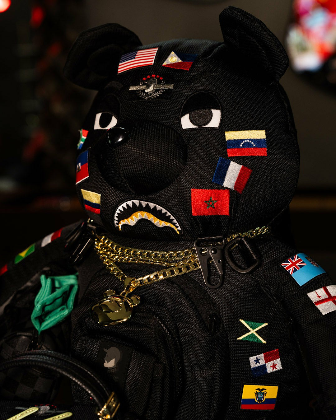 JAMES FIRST CLASS GLOBAL FLAGS MONEYBEAR BACKPACK | Sprayground Outlets