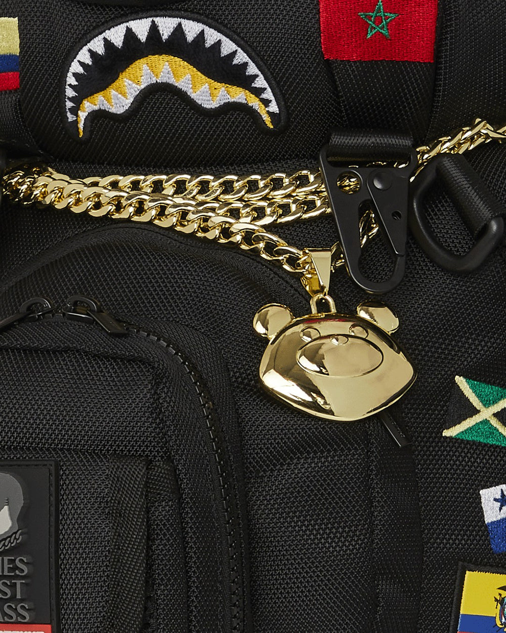 JAMES FIRST CLASS GLOBAL FLAGS MONEYBEAR BACKPACK | Sprayground Outlets