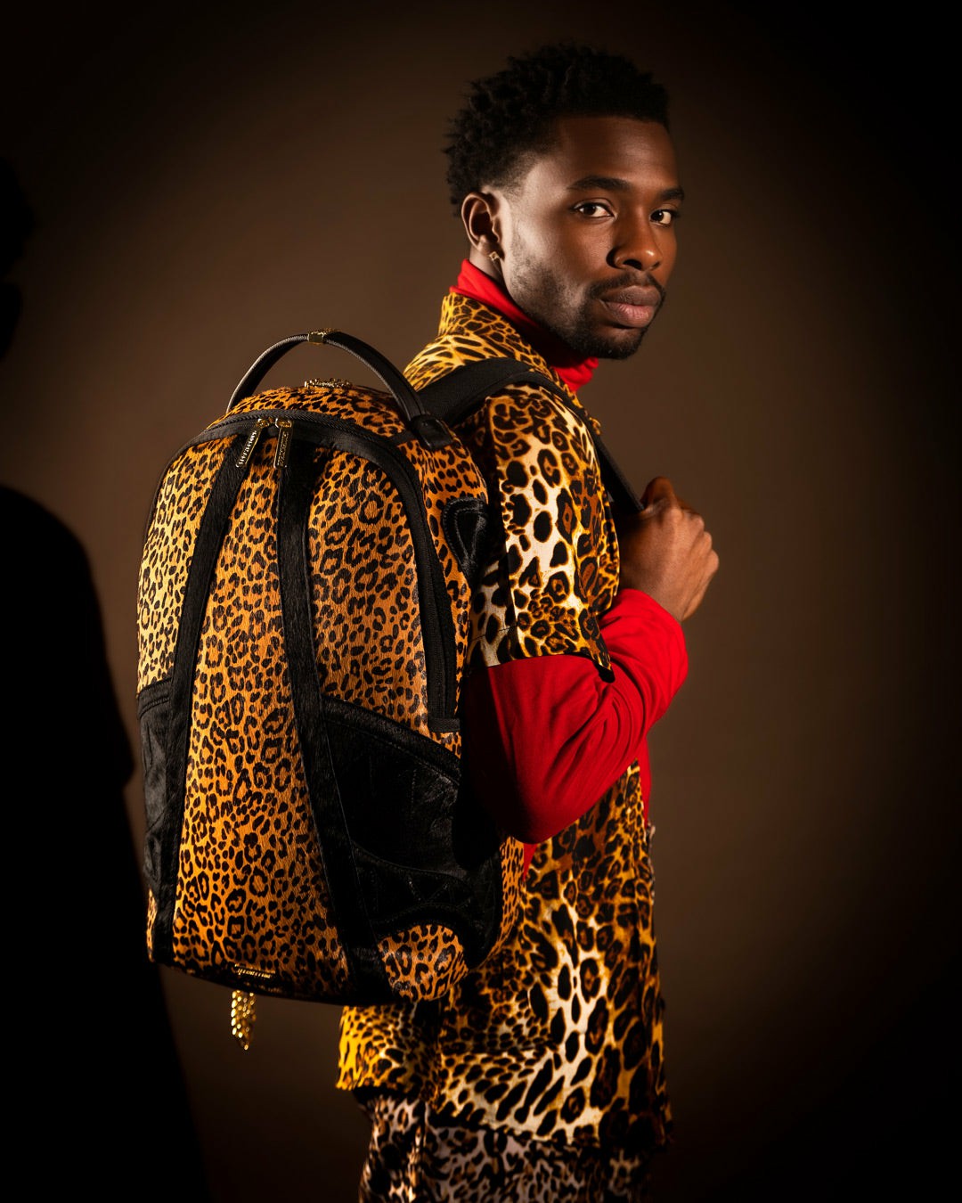 AFRICAN INTELLIGENCE 9 COURAGE LIVES ON BACKPACK - SANDFLOWER COLLAB | Sprayground Outlets