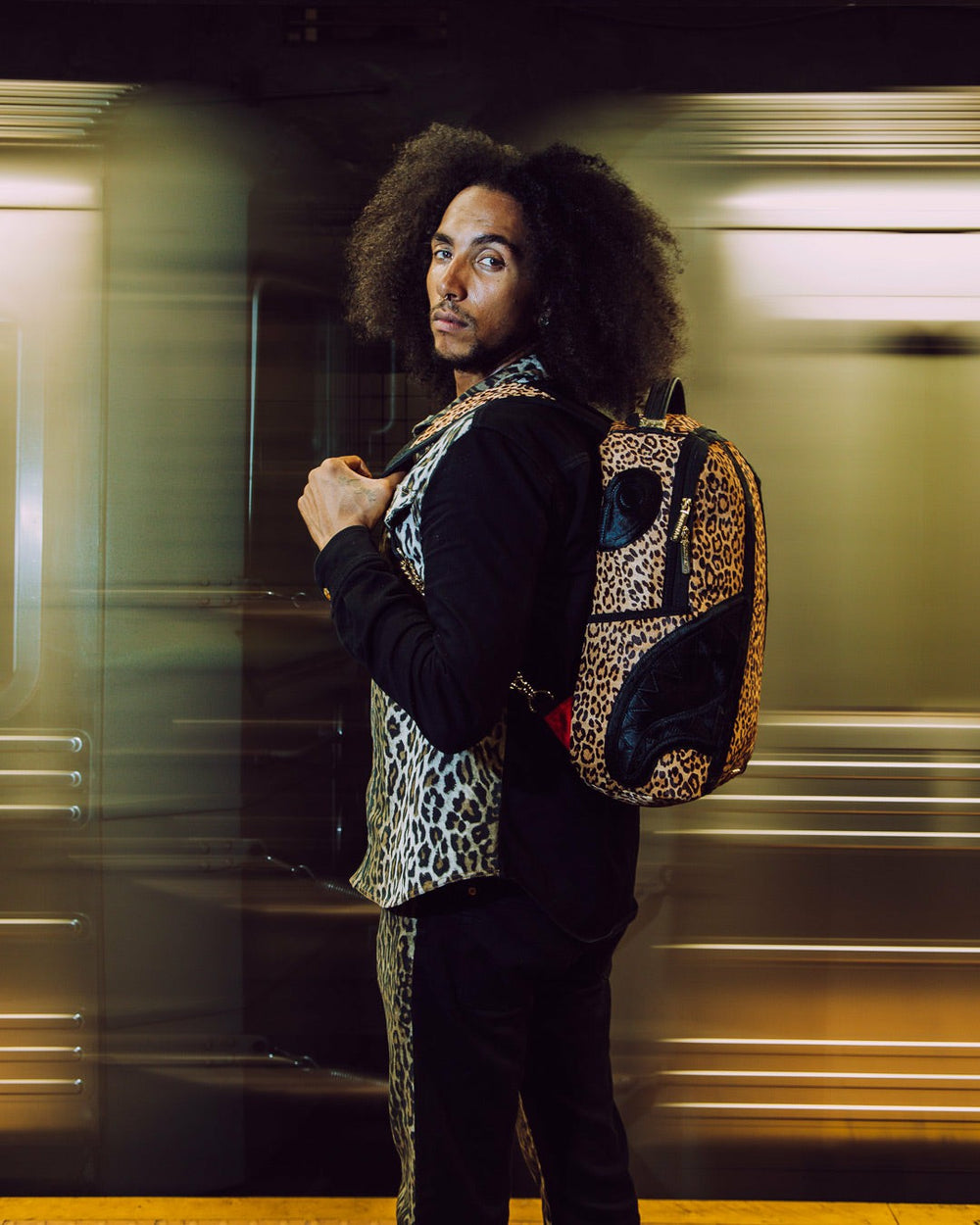AFRICAN INTELLIGENCE 9 COURAGE LIVES ON BACKPACK - SANDFLOWER COLLAB | Sprayground Outlets