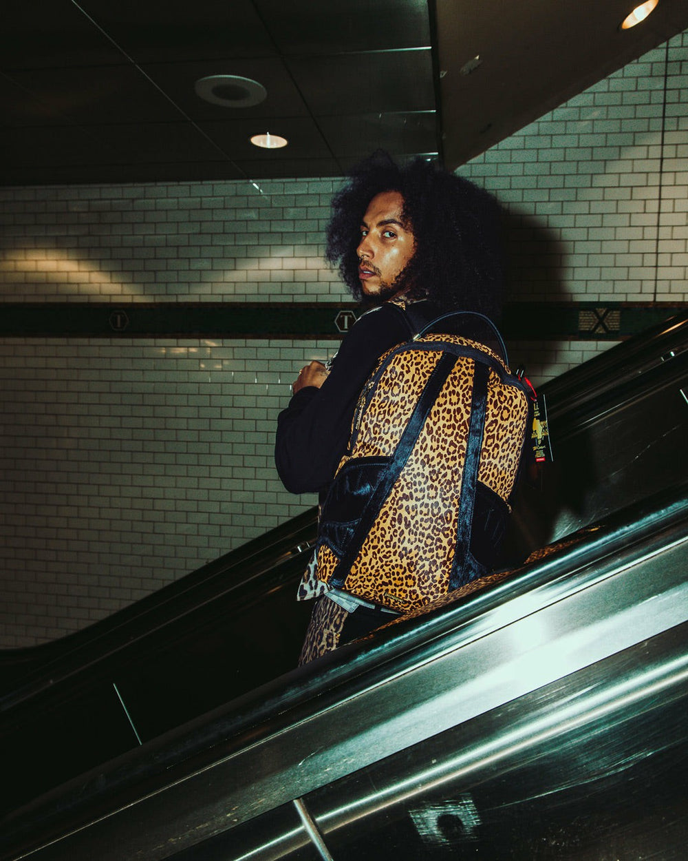 AFRICAN INTELLIGENCE 9 COURAGE LIVES ON BACKPACK - SANDFLOWER COLLAB | Sprayground Outlets