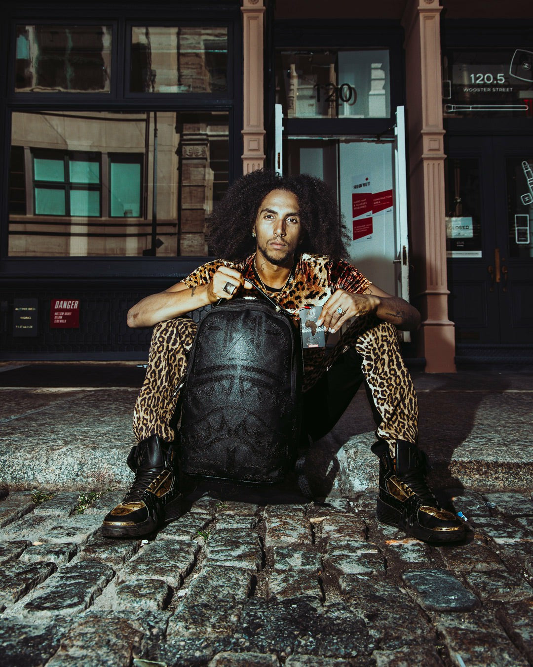 AFRICAN INTELLIGENCE 9 APEX GENIUS BACKPACK - SANDFLOWER COLLAB | Sprayground Bargain