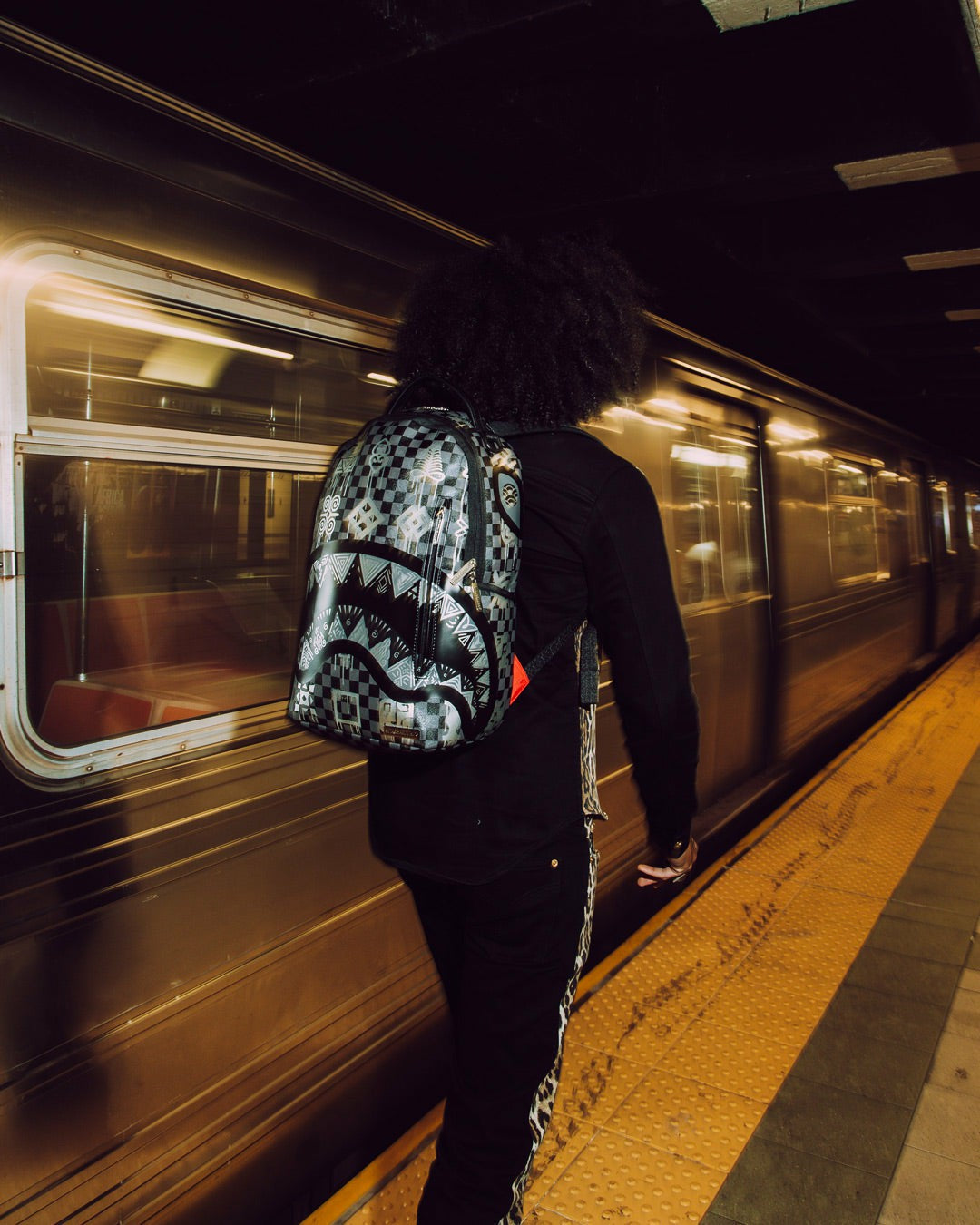 AFRICAN INTELLIGENCE 9 POWER GLYPHICS BACKPACK - SANDFLOWER COLLAB | Sprayground Savings