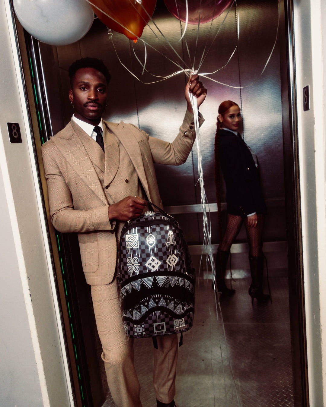 AFRICAN INTELLIGENCE 9 POWER GLYPHICS BACKPACK - SANDFLOWER COLLAB | Sprayground Savings