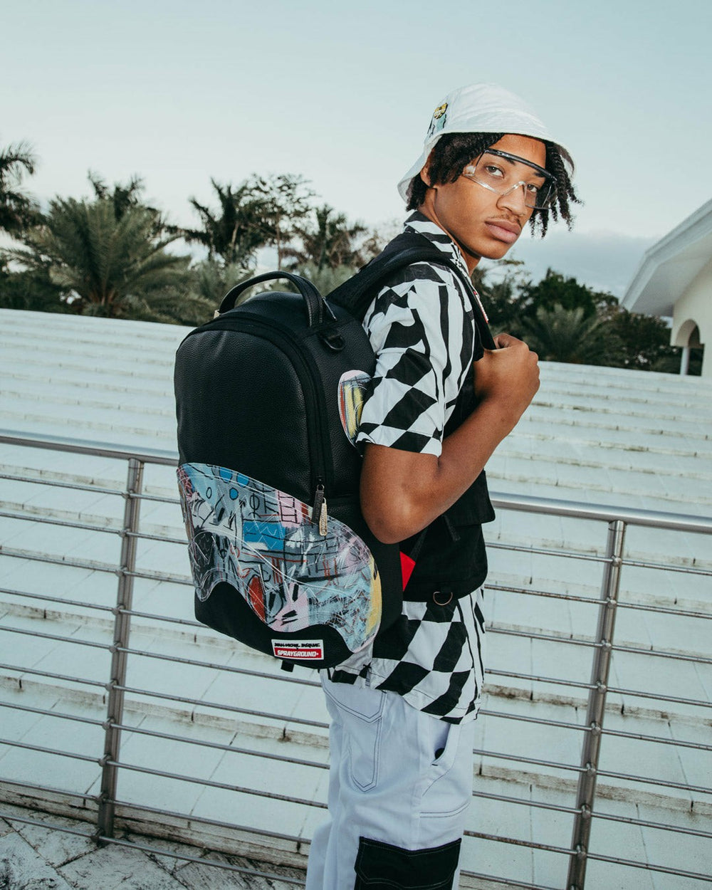 OFFICIAL BASQUIAT UNTITLED 1982 BACKPACK (DLXV) | Sprayground Special Offer