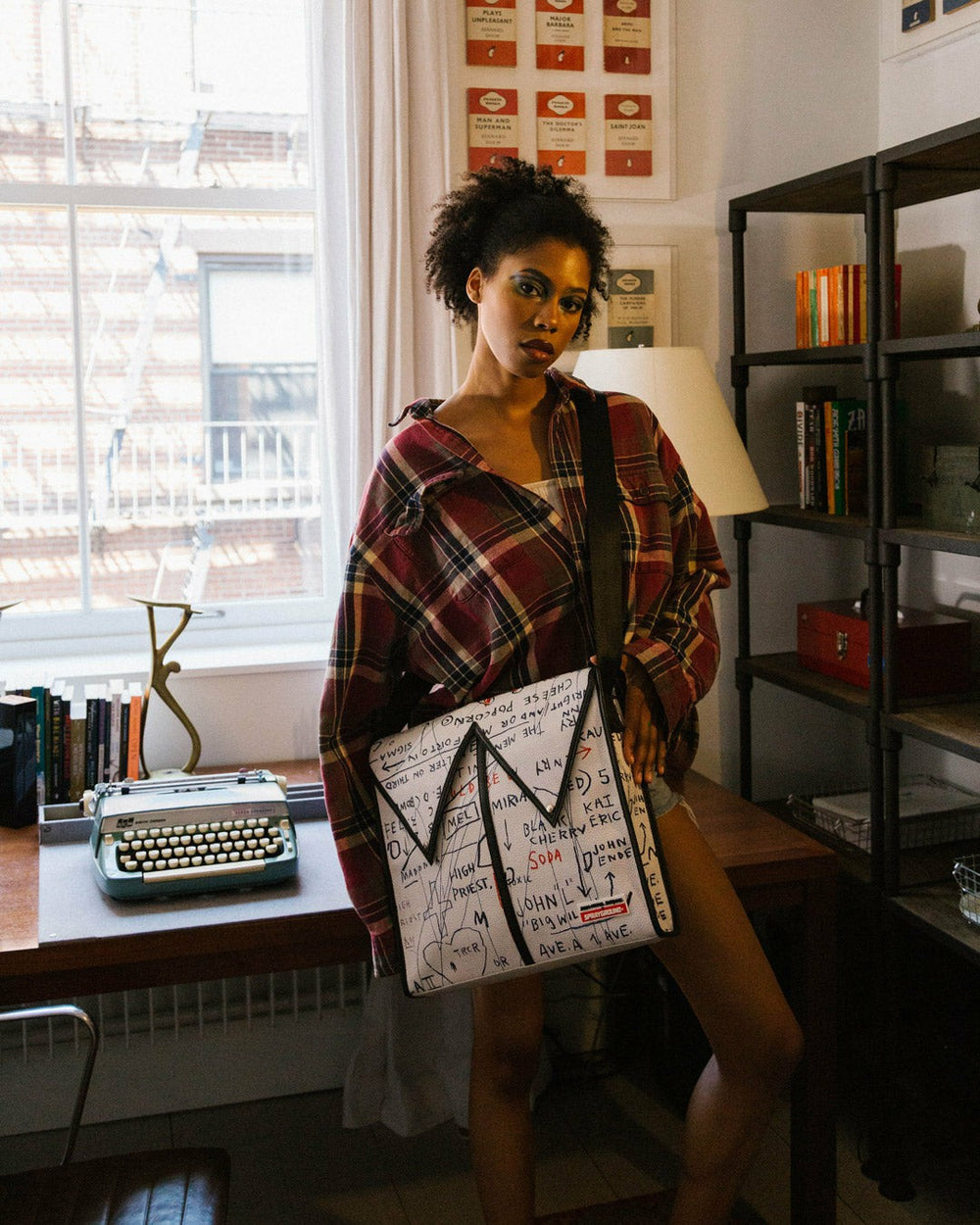 OFFICIAL BASQUIAT UNTITLED (CHEESE POPCORN) 1983 SLING MESSENGER | Sprayground Savings