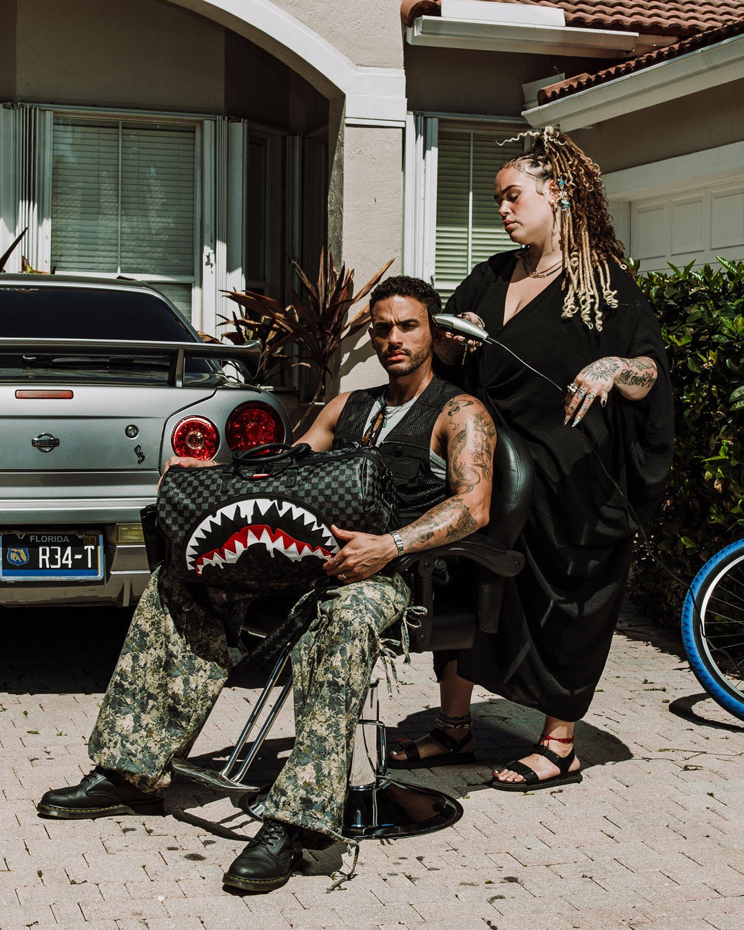 SHARKS IN PARIS THUNDERDRIP DUFFLE | Sprayground Savings
