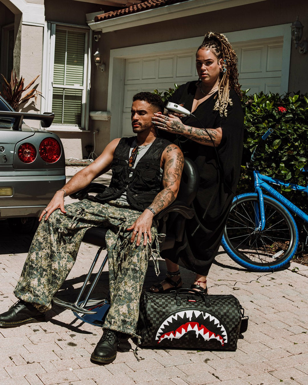 SHARKS IN PARIS THUNDERDRIP DUFFLE | Sprayground Savings