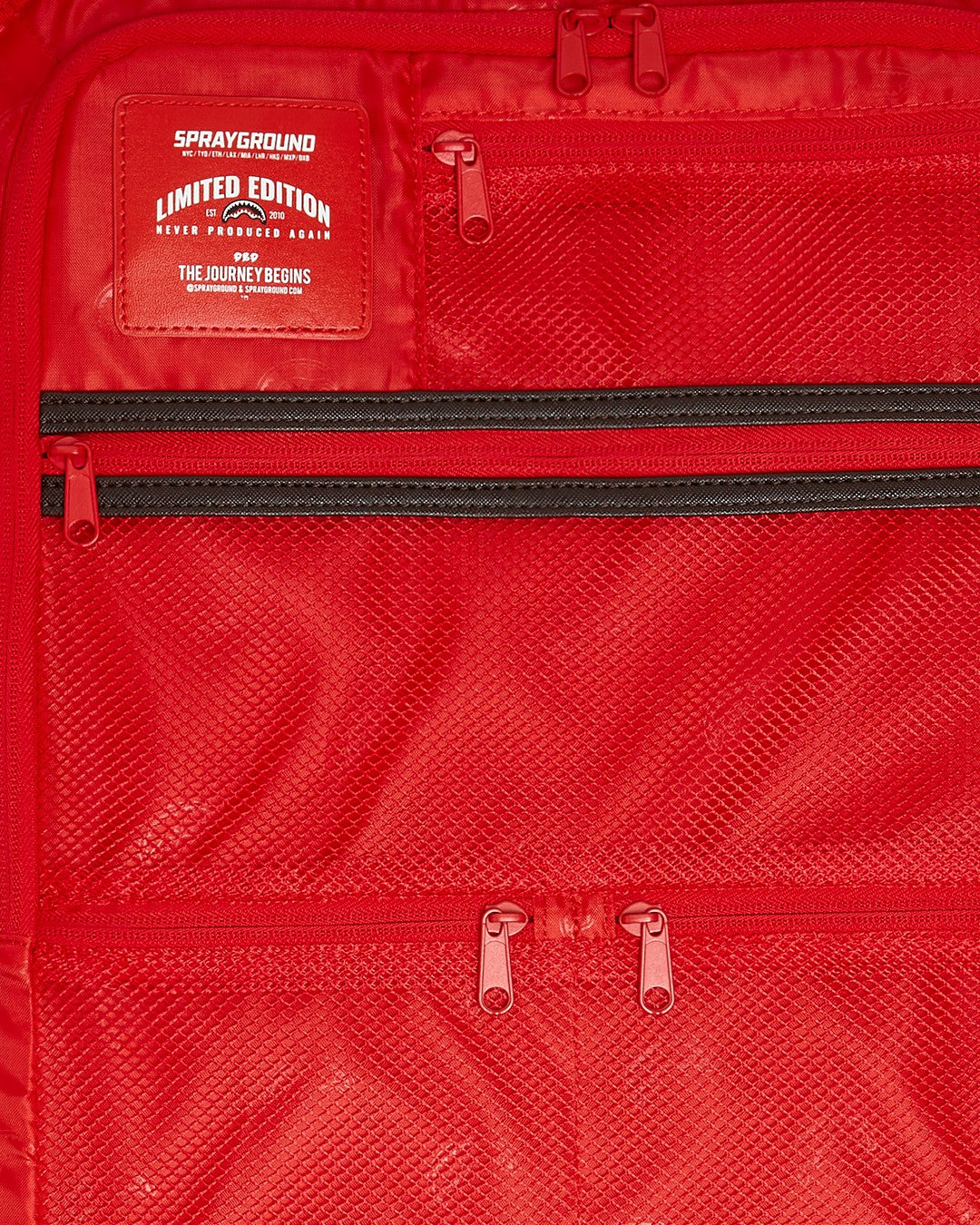 EXTERIOR GOLD ZIP POCKET SHARKS IN PARIS JETSETTER CARRY-ON LUGGAGE | Sprayground Sale