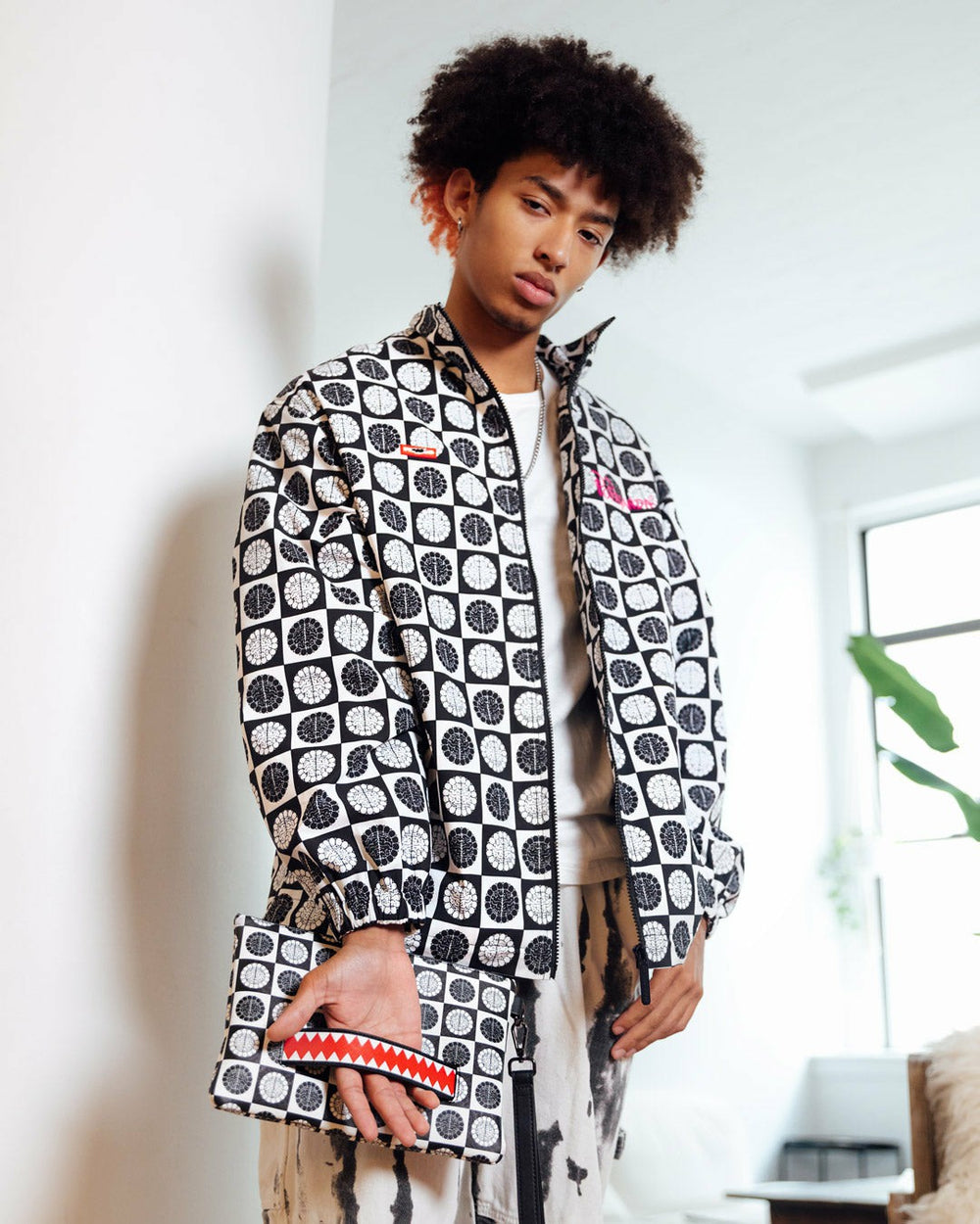 POODLE CHECK RON ENGLISH COLLAB POUCHETTE | Sprayground Savings