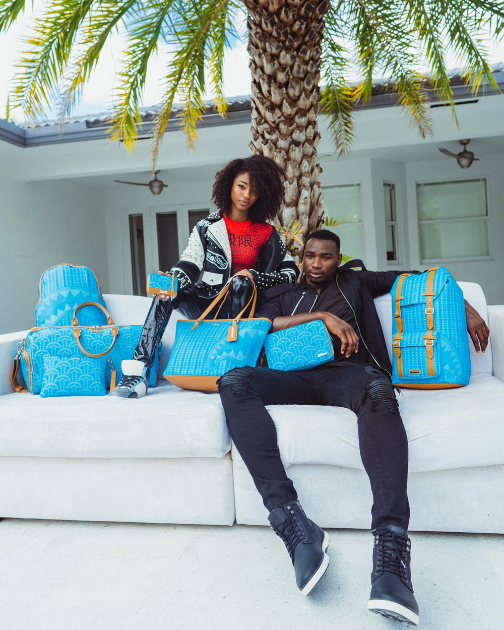 ILLUCHAINS TURQ CROSSOVER CLUTCH | Sprayground Bargain