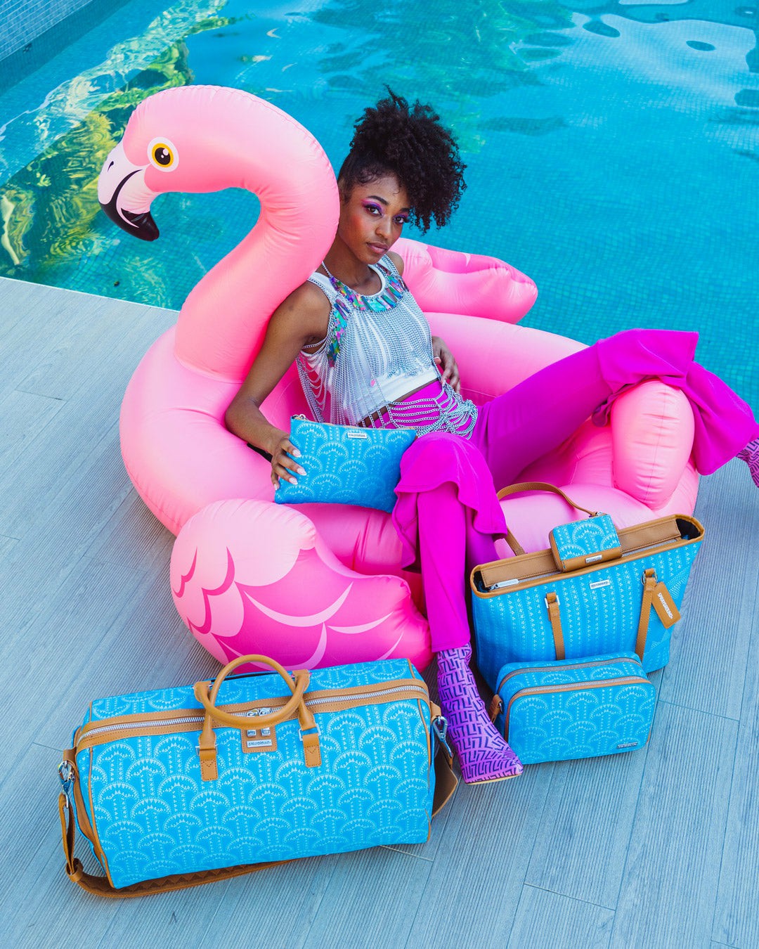ILLUCHAINS TURQ CROSSOVER CLUTCH | Sprayground Bargain