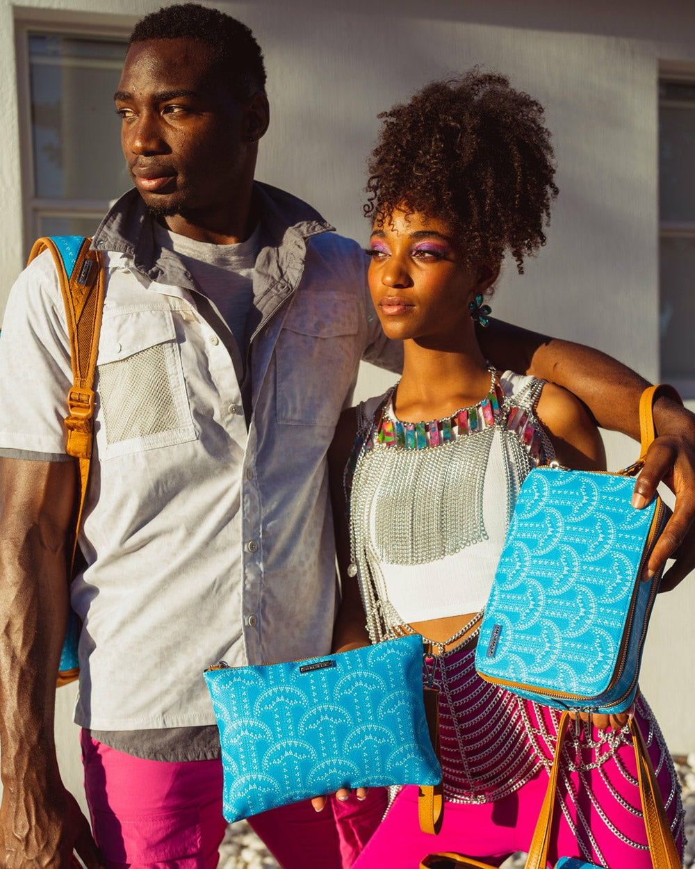 ILLUCHAINS TURQ CROSSOVER CLUTCH | Sprayground Bargain