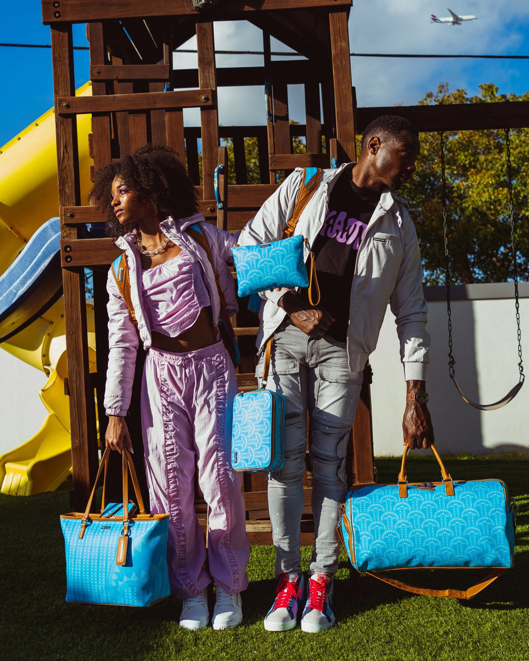 ILLUCHAINS TURQ CROSSOVER CLUTCH | Sprayground Bargain