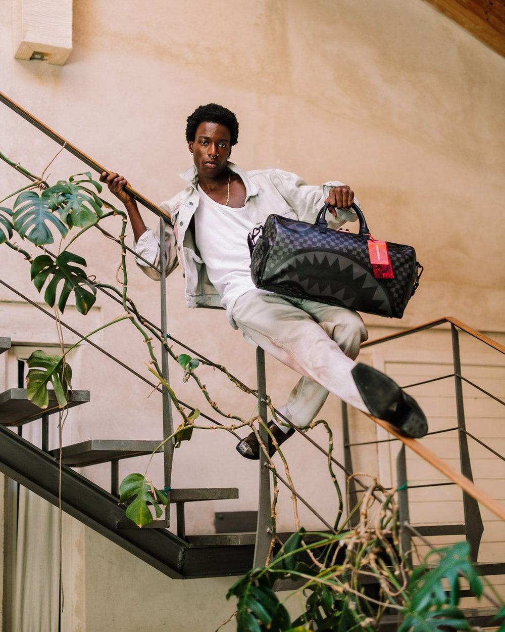 HANGOVER DRIP CHECK DUFFLE | Sprayground Value Deal