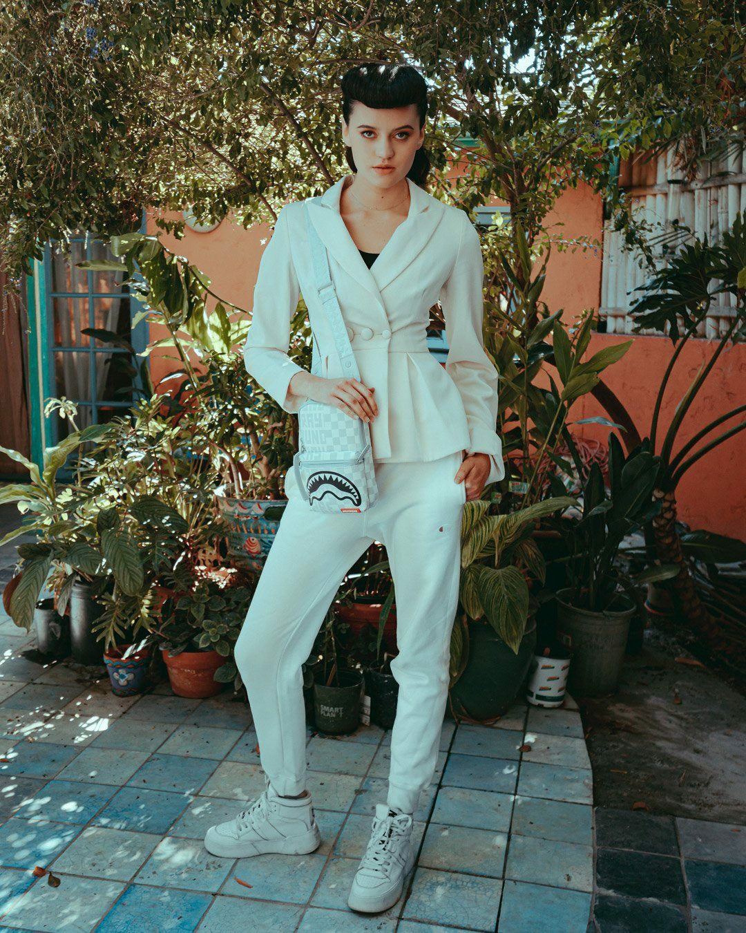 SPLIT THE CHECK (PEARL) SLING | Sprayground On Sale