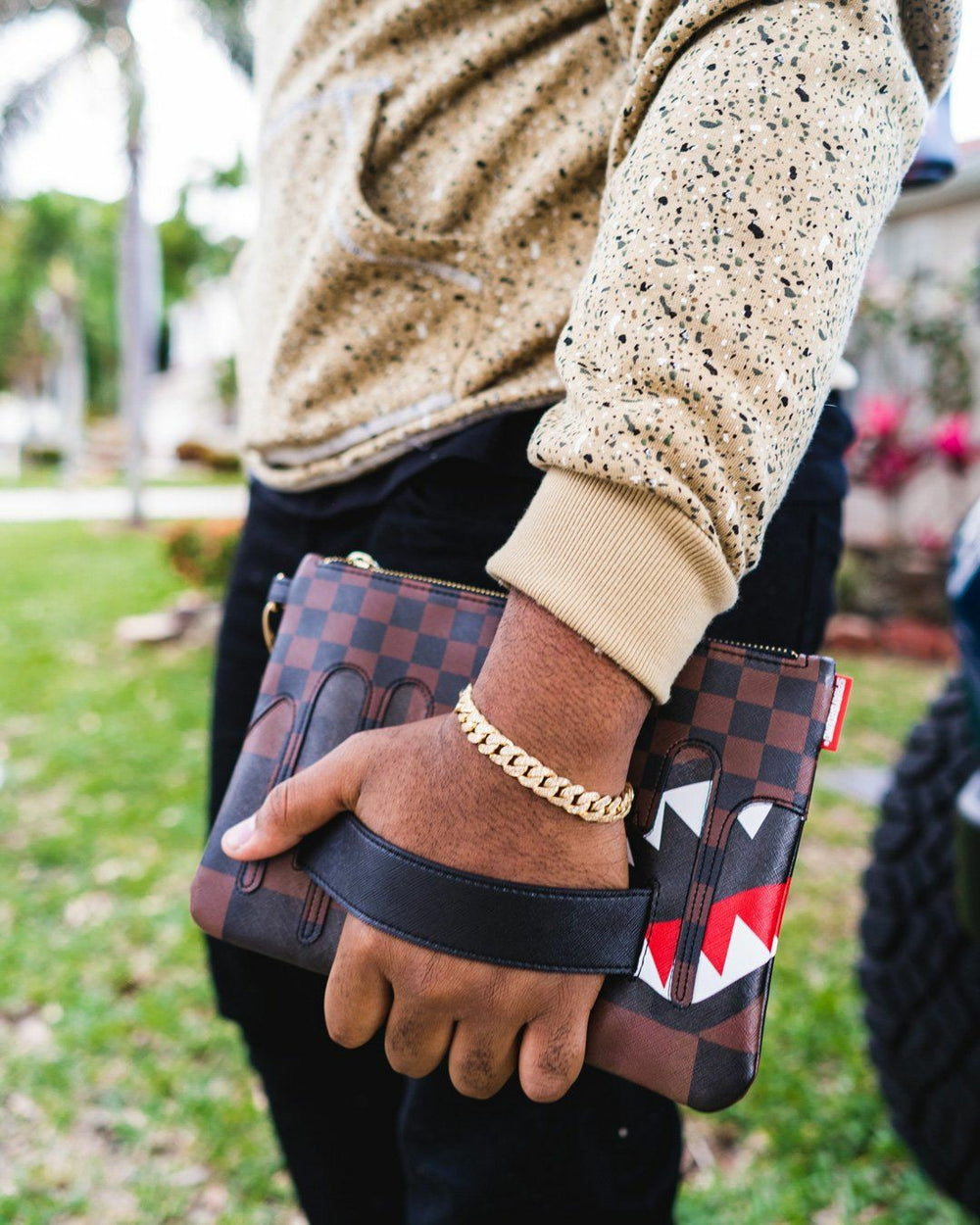 XTC SHARKS IN PARIS CROSSOVER CLUTCH | Sprayground Limited Offer