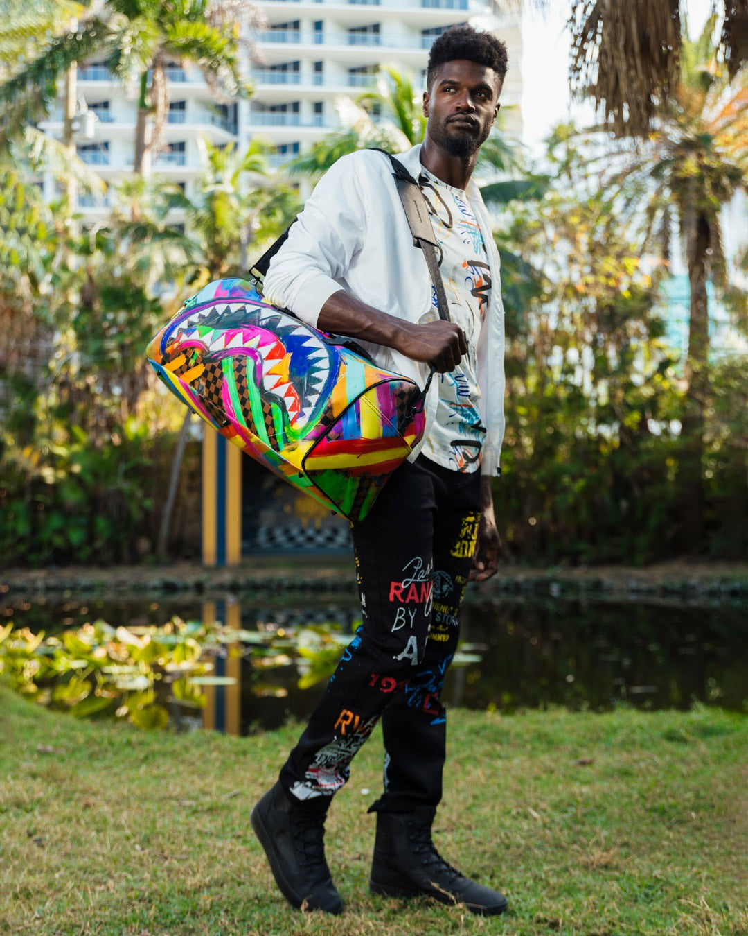 SHARKS IN PARIS CITY STREAKS DUFFLE | Sprayground On Sale