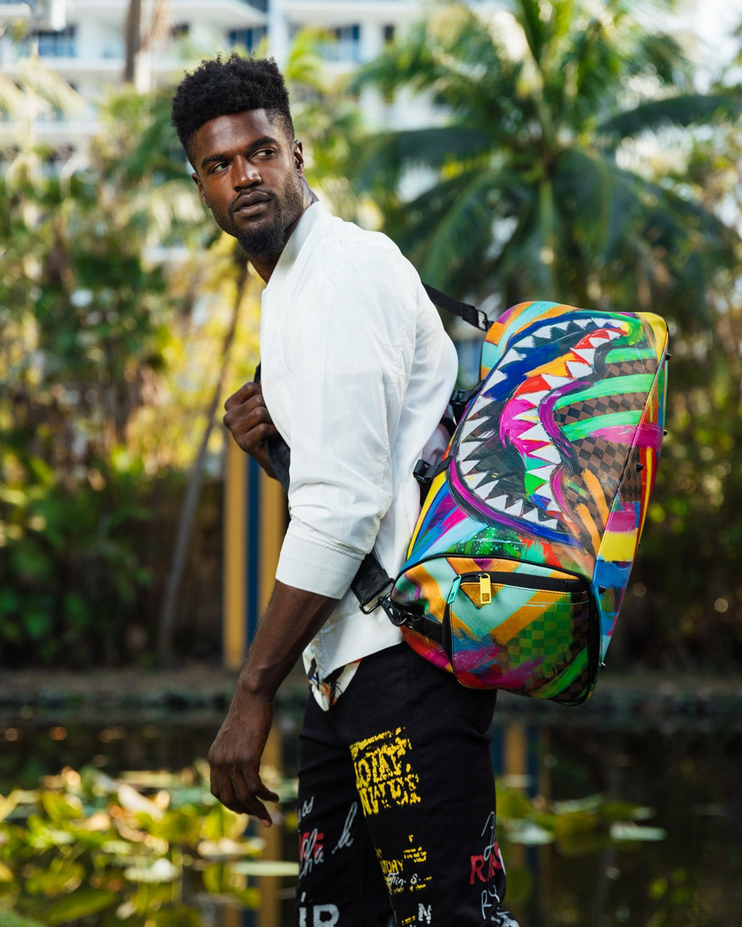 SHARKS IN PARIS CITY STREAKS DUFFLE | Sprayground On Sale