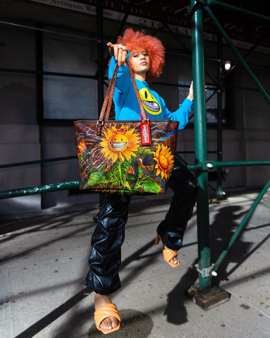 SUNFLOWER GRIN RON ENGLISH COLLAB TOTE | Sprayground On Sale