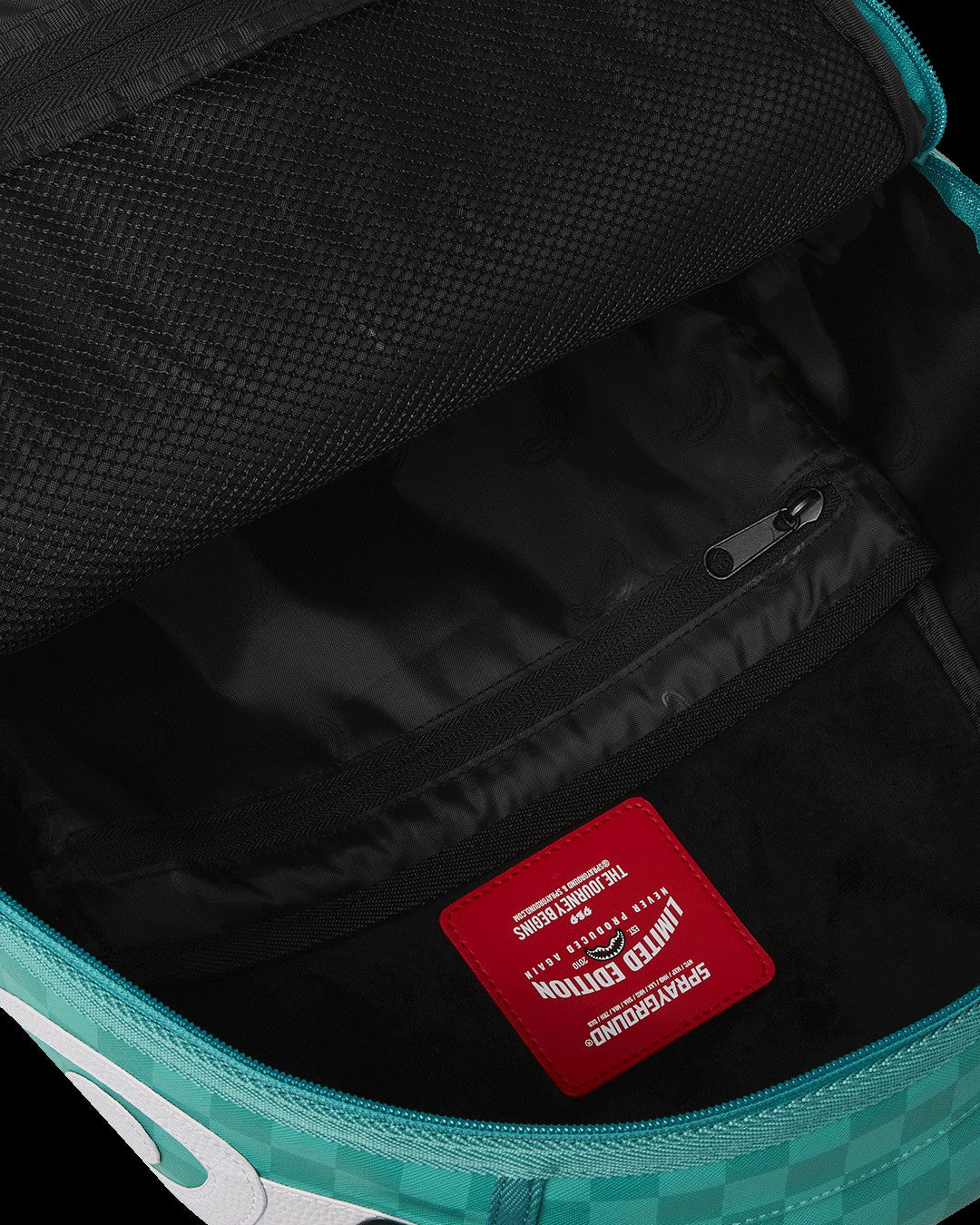 SQUID GAME COLLAB JUMPSUIT BACKPACK | Sprayground Exclusive Deal