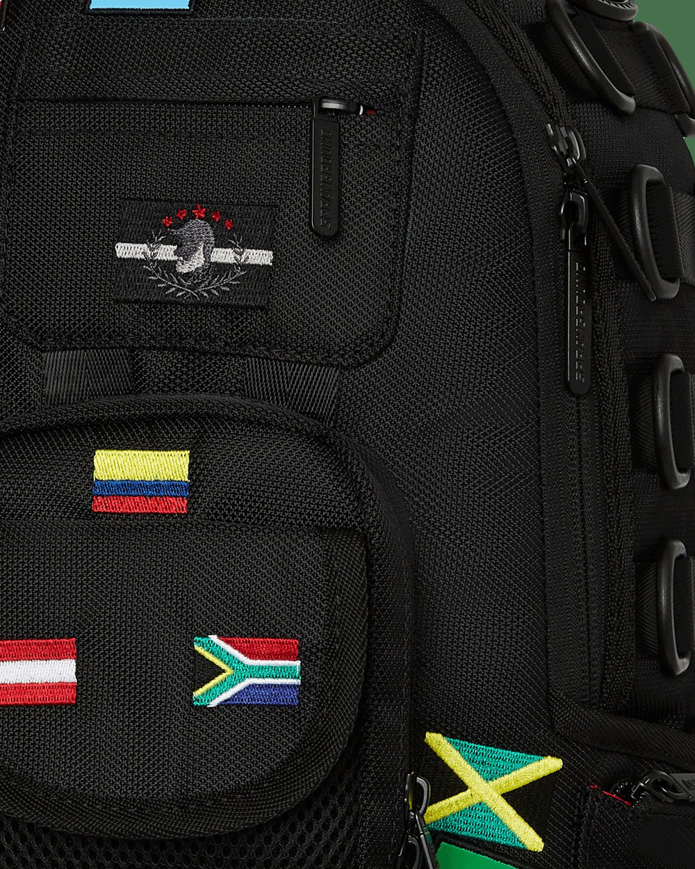 JAMES FIRST CLASS GLOBAL FLAGS SPECIAL OPS CARGO BACKPACK | Sprayground Bargain