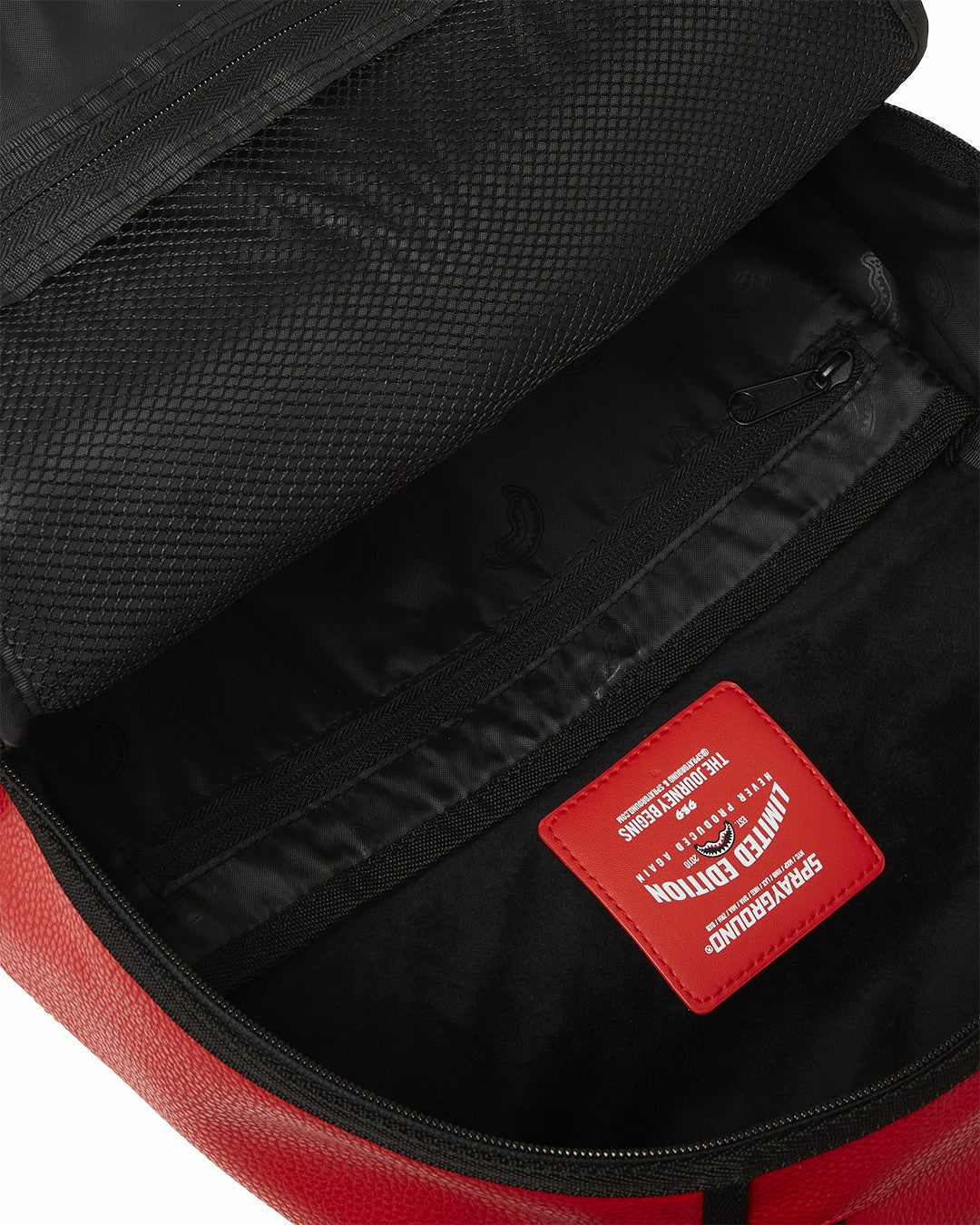 SHARK CENTRAL EMBOSSED DRIP DLXSV BACKPACK | Sprayground Exclusive Deal