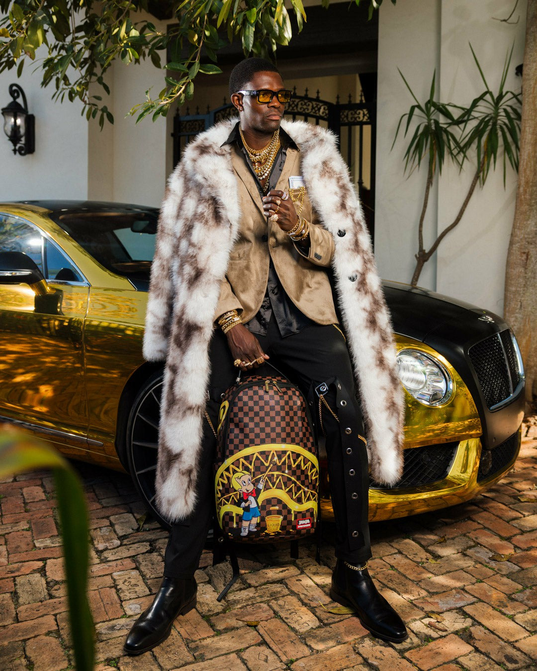 RICHIE RICH PAINT THE SHARK GOLD BACKPACK | Sprayground Outlets