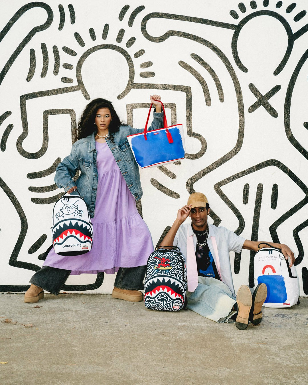 KEITH HARING BIG BLUE PURSE ART BACKPACK | Sprayground Sale