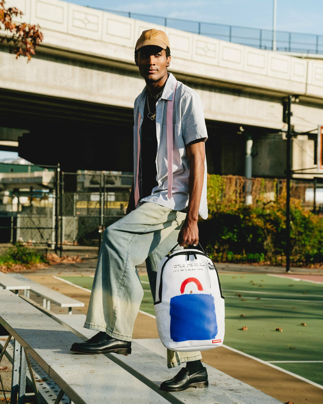 KEITH HARING BIG BLUE PURSE ART BACKPACK | Sprayground Sale