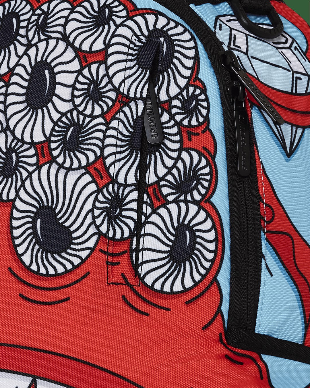 JORGE RODRIGUEZ THE ARTIST COLLAB BLINKY SHARK BACKPACK | Sprayground Savings