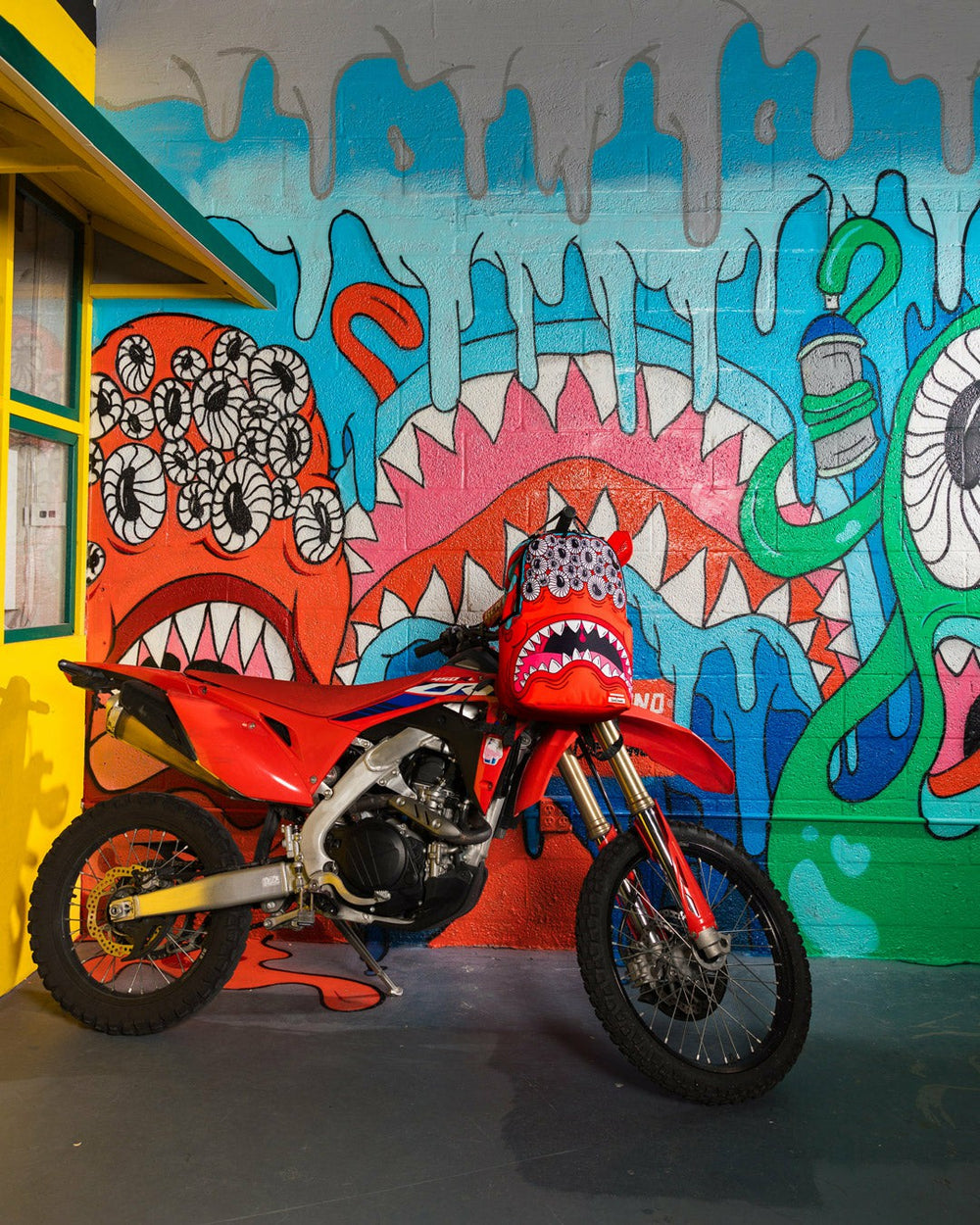 JORGE RODRIGUEZ THE ARTIST COLLAB BLINKY SHARK BACKPACK | Sprayground Savings