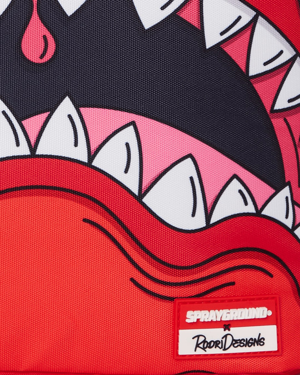 JORGE RODRIGUEZ THE ARTIST COLLAB BLINKY SHARK BACKPACK | Sprayground Savings