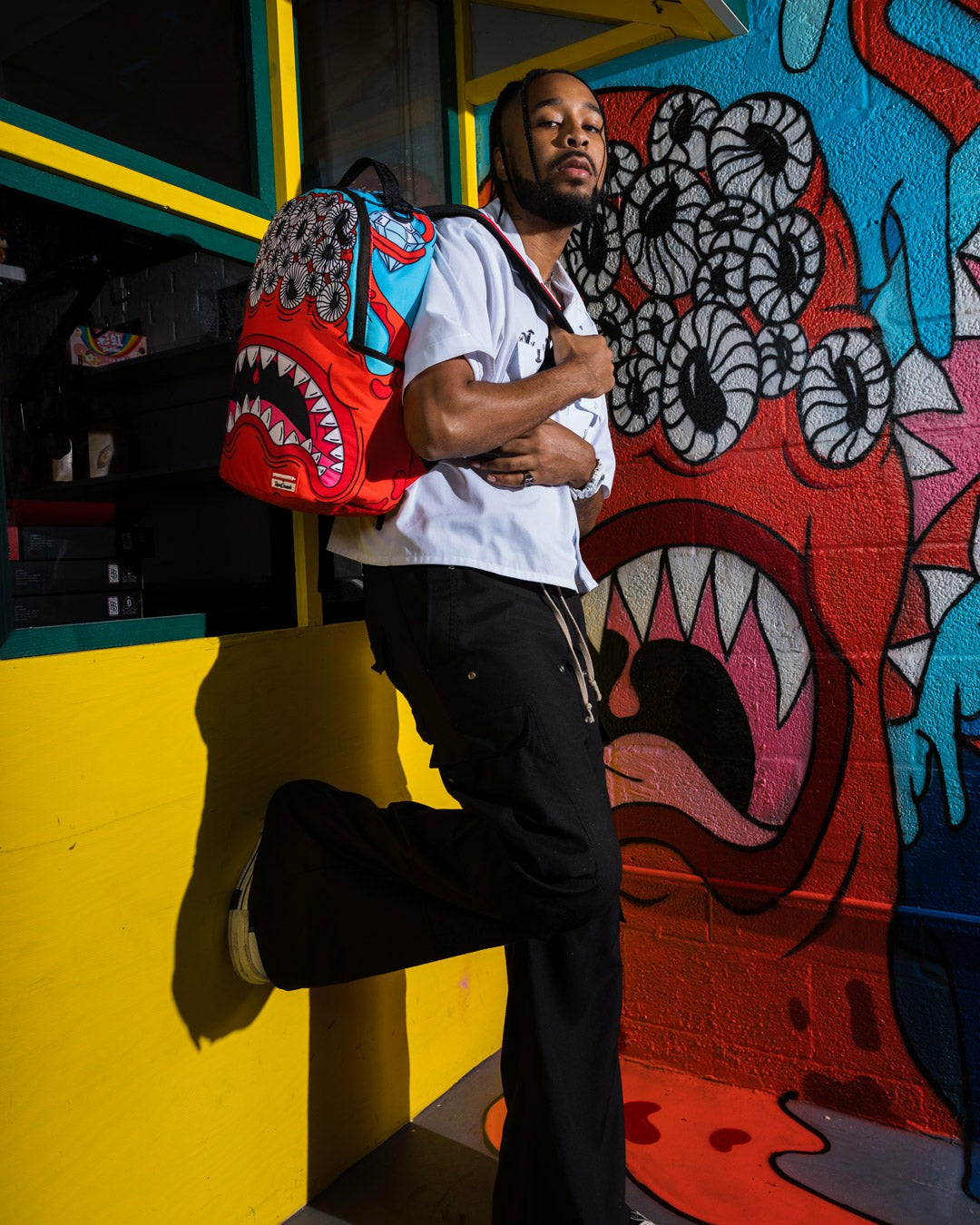 JORGE RODRIGUEZ THE ARTIST COLLAB BLINKY SHARK BACKPACK | Sprayground Savings