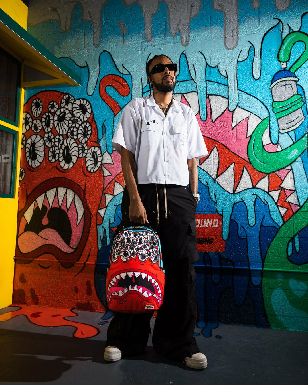 JORGE RODRIGUEZ THE ARTIST COLLAB BLINKY SHARK BACKPACK | Sprayground Savings
